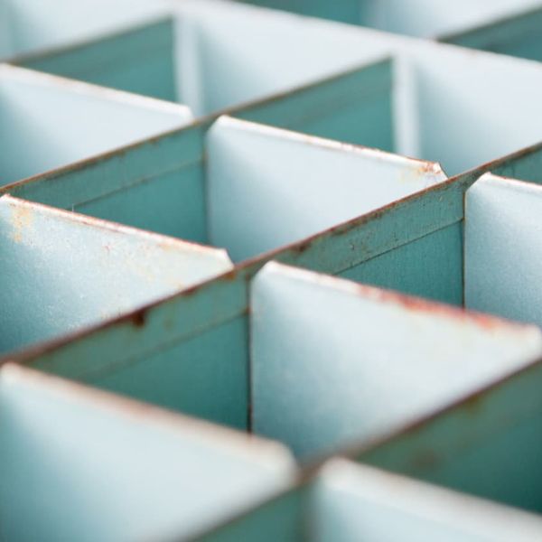 Gray metal cube container - Photo by Ilze Lucero